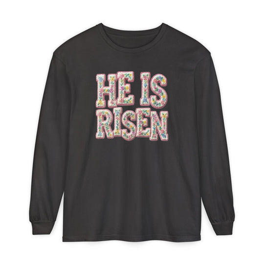 He is Risen Long Sleeve Tee with floral embroidery-style text on black, 100% ring-spun cotton, offering a relaxed, comfortable fit.