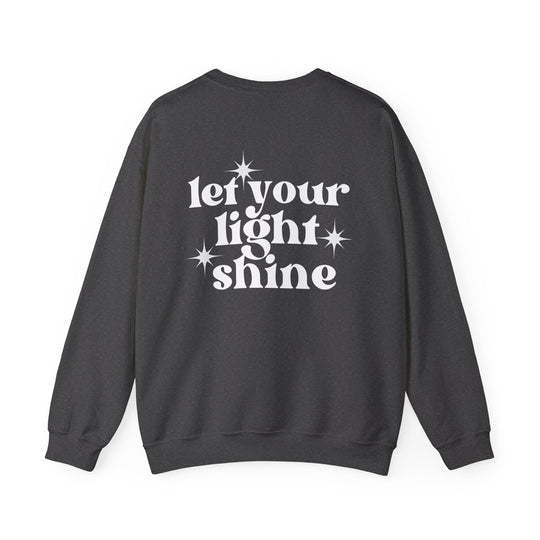 Unisex heavy blend crewneck sweatshirt featuring Let Your Light Shine design. Ribbed knit collar, no itchy side seams. 50% Cotton 50% Polyester, medium-heavy fabric, loose fit, true to size. Dimensions: Width, Length, Sleeve length.