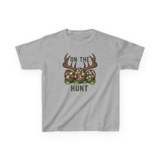 On the Hunt Kids Tee featuring camouflage eggs and deer antlers graphic, perfect for everyday wear with durable, soft cotton blend fabric.