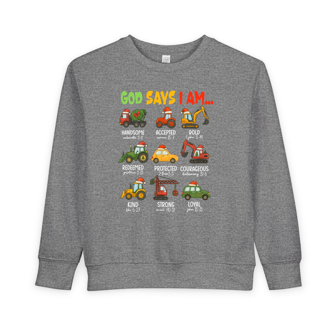 Heather-gray toddler crewneck sweatshirt with Christmas-themed graphic, featuring cartoon vehicles in Santa hats and virtues with Bible references. Warm fleece blend, durable ribbed details.