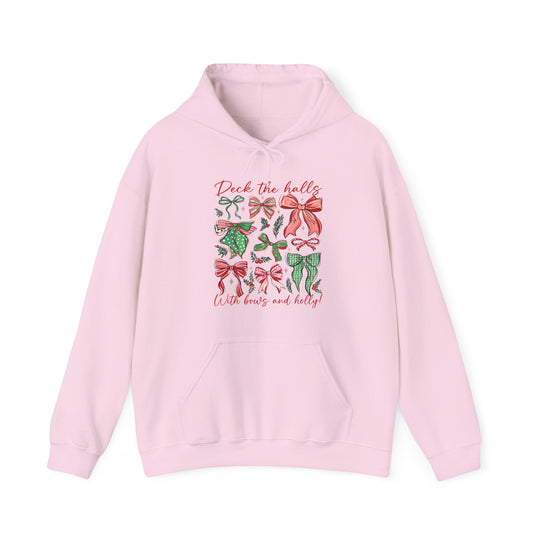 Deck the Halls Hoodie featuring festive red-and-green bow graphics and holly sprigs, with a kangaroo pocket and drawstrings for comfort and style.