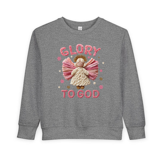 Heather-gray toddler sweatshirt featuring a chunky-yarn angel with pink wings, snowflake motifs, and GLORY TO GOD text, designed for warmth and durability.