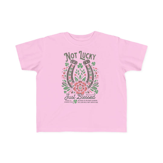 Blessed Toddler's Tee featuring a horseshoe graphic, designed for comfort with soft, light fabric, perfect for toddlers' sensitive skin and first adventures.