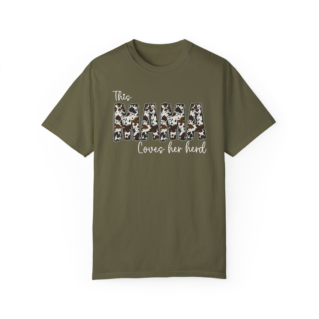A Mama Herd Tee, garment-dyed with ring-spun cotton for coziness. Relaxed fit, double-needle stitching for durability, tubular shape. Ideal daily wear from Worlds Worst Tees.