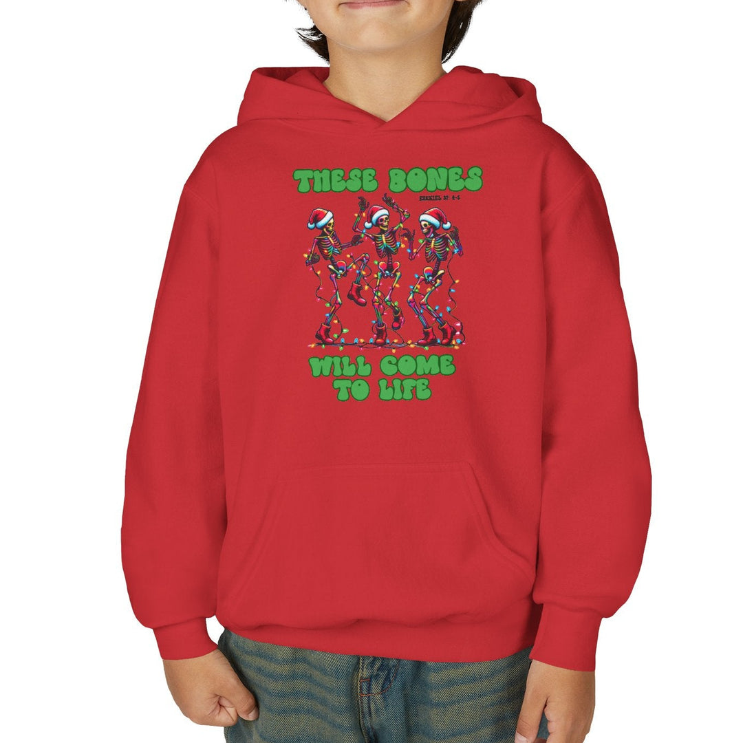 Child wearing a Bones Come to Life Youth Hoodie with dancing skeletons and Christmas lights print, paired with blue jeans.