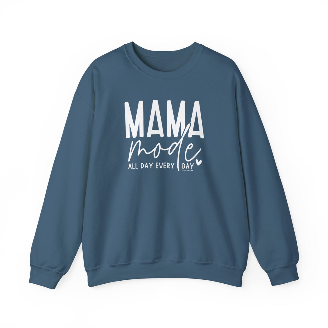 Unisex Mama Mode Crew sweatshirt, blue with white text. Heavy blend fabric, ribbed knit collar, no itchy seams. 50% cotton, 50% polyester, loose fit, true to size. Ideal for comfort in any situation.