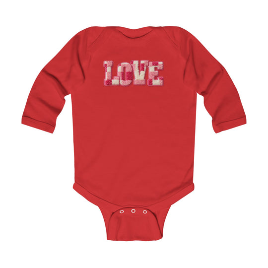 Infant Love onesie features a red long-sleeve design with chenille applique, offering comfort and easy changes with snap closures. Perfect for stylish, durable baby wear.