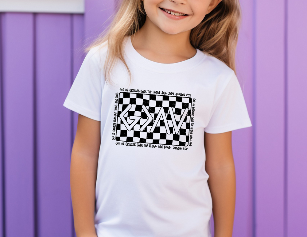 Smiling girl wearing the Gods Highs and Lows Toddler Tee, showcasing the Bella Canvas short sleeve design for trendy, comfortable children's clothing.