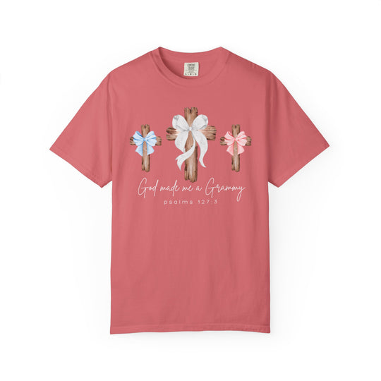 Coral-colored tee featuring three rustic wooden crosses with bows, God made me a Grammy, and psalms 127:3. Comfortable, relaxed-fit, 100% cotton.