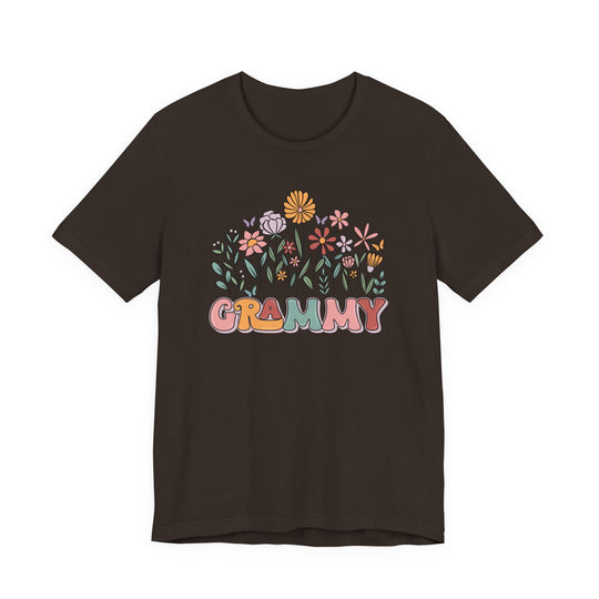 Grammy Flower Tee featuring pastel flowers above GRAMMY in retro style on a dark T-shirt, showcasing a classic unisex fit with soft cotton.