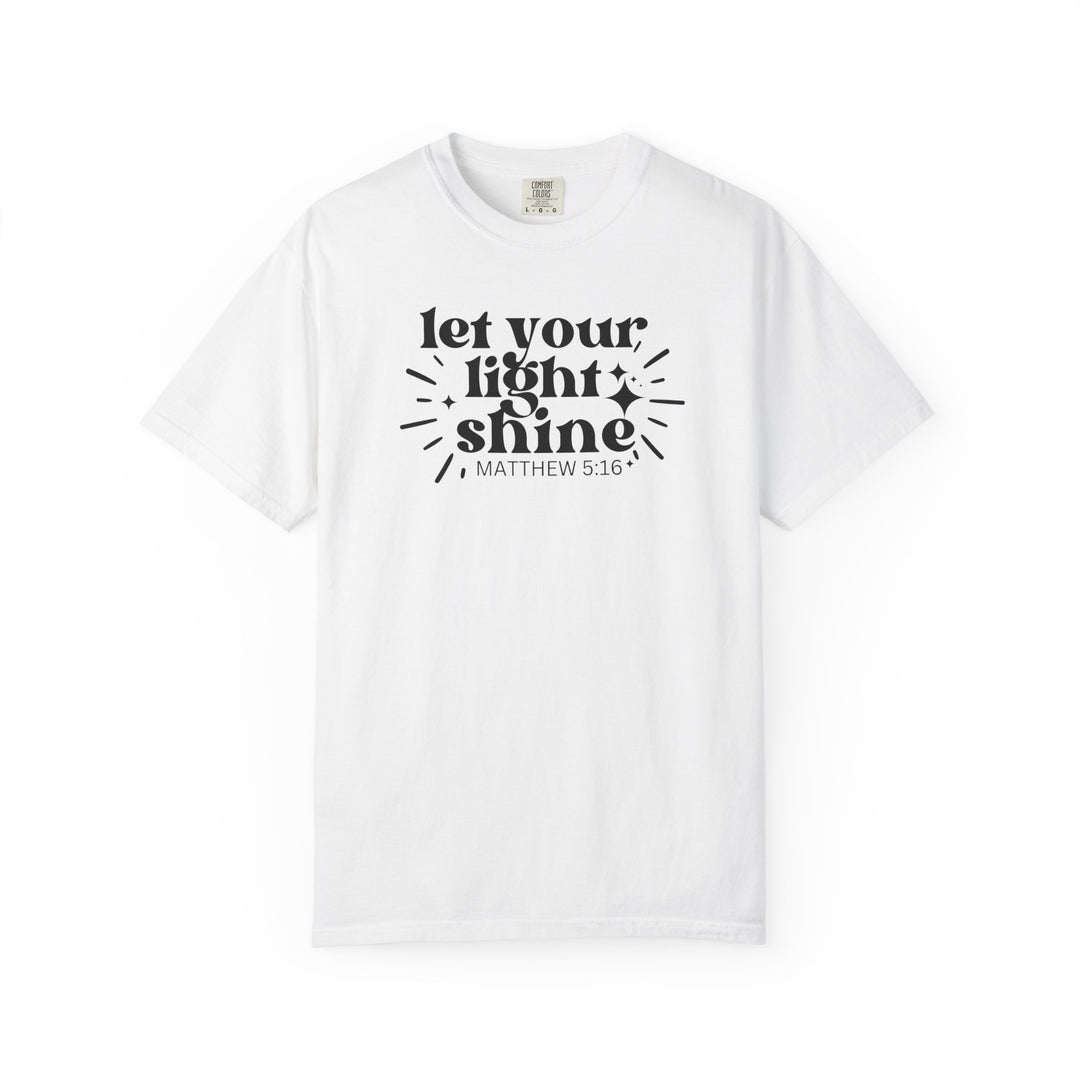 White Let Your Light Shine tee with Matthew 5:16 graphic and star-burst accents, featuring a relaxed fit and durable, soft-washed cotton fabric.