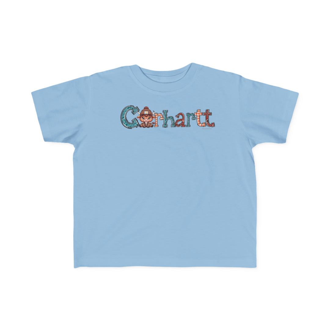 A durable Cowhartt Toddler Tee, featuring a cartoon cow and letters, perfect for sensitive skin. 100% combed ringspun cotton, light fabric, tear-away label, classic fit. Sizes: 2T, 3T, 4T, 5-6T.
