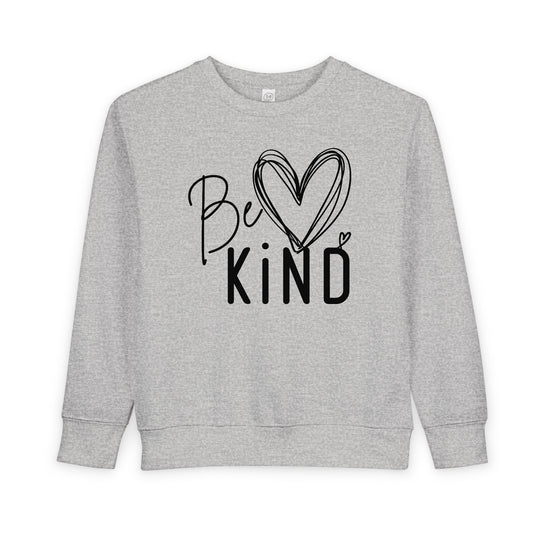 Light-gray Be Kind toddler crewneck sweatshirt with handwritten and block font graphic, featuring durable ribbed cuffs and collar for comfort and warmth.