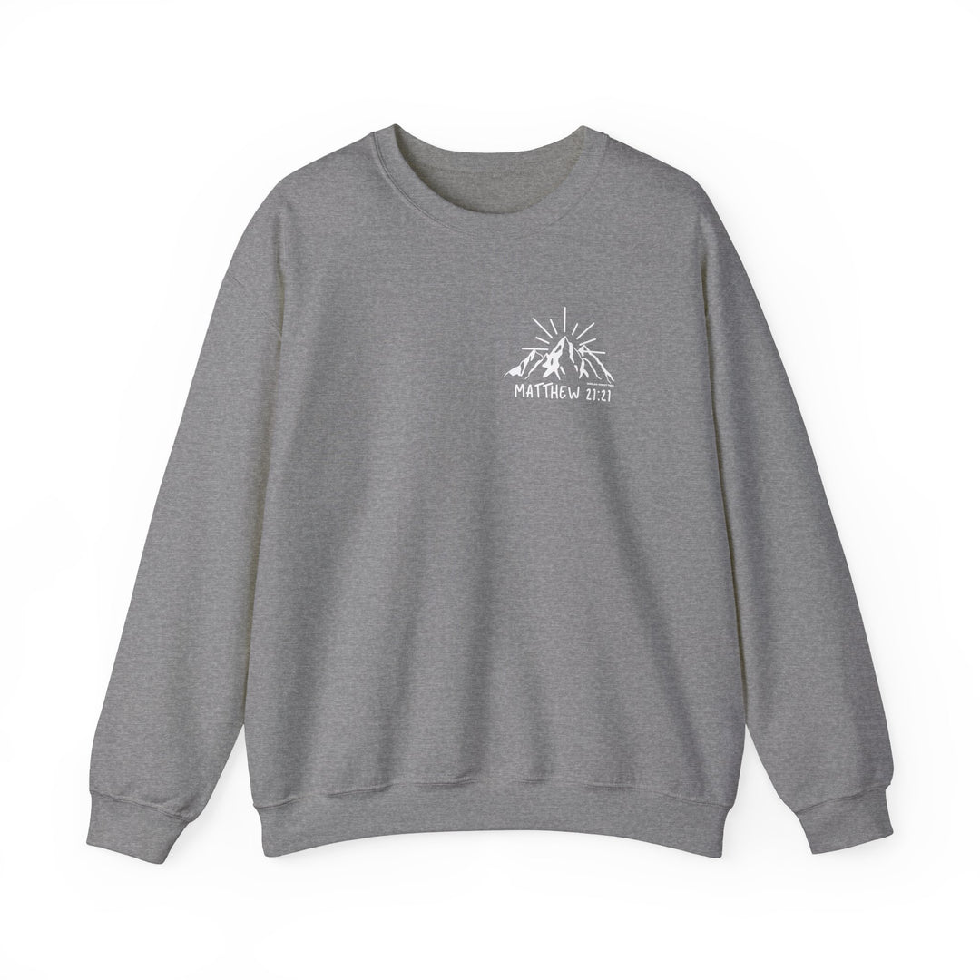 Unisex heavy blend crewneck sweatshirt featuring a mountain and sun logo. Made from 50% cotton, 50% polyester for comfort and durability. Classic fit with ribbed knit collar and double-needle stitching. Ethically made in the US.