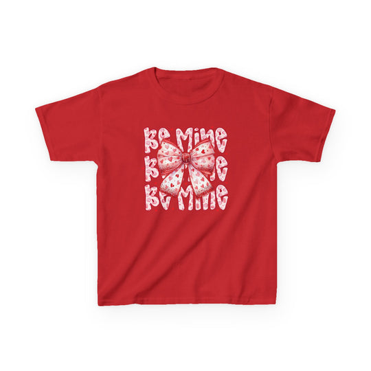 Be Mine Kids Tee: Red short-sleeve shirt with BE MINE in bubble letters and a pink bow, suitable for daily wear, 100% cotton.