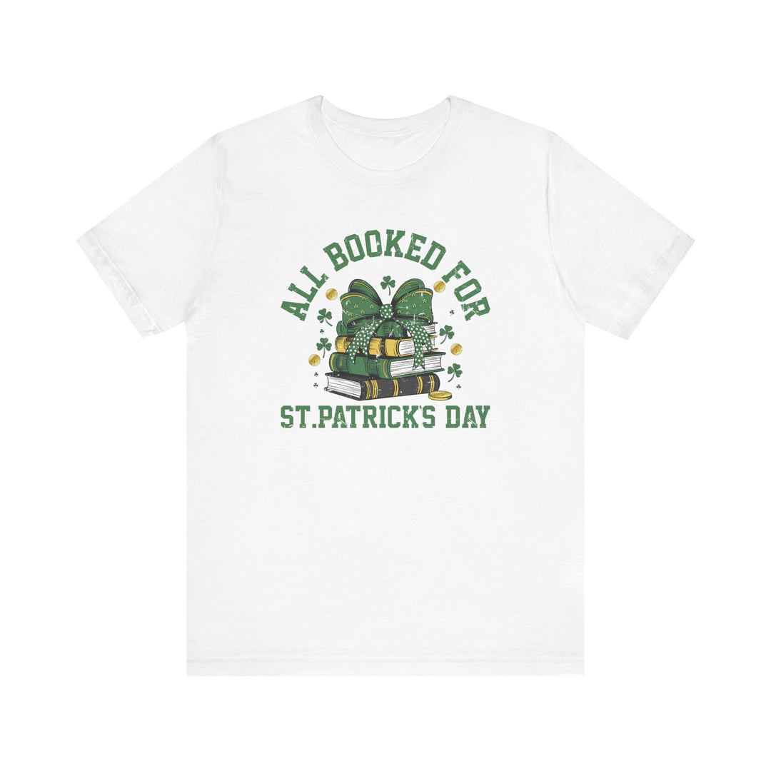 Booked for St. Patrick's Day Tee: A white t-shirt featuring green text and graphics, perfect for festive occasions. Made from soft cotton for comfort and durability.