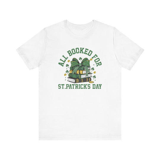 Booked for St. Patrick's Day Tee: A white t-shirt featuring green text and graphics, perfect for festive occasions. Made from soft cotton for comfort and durability.