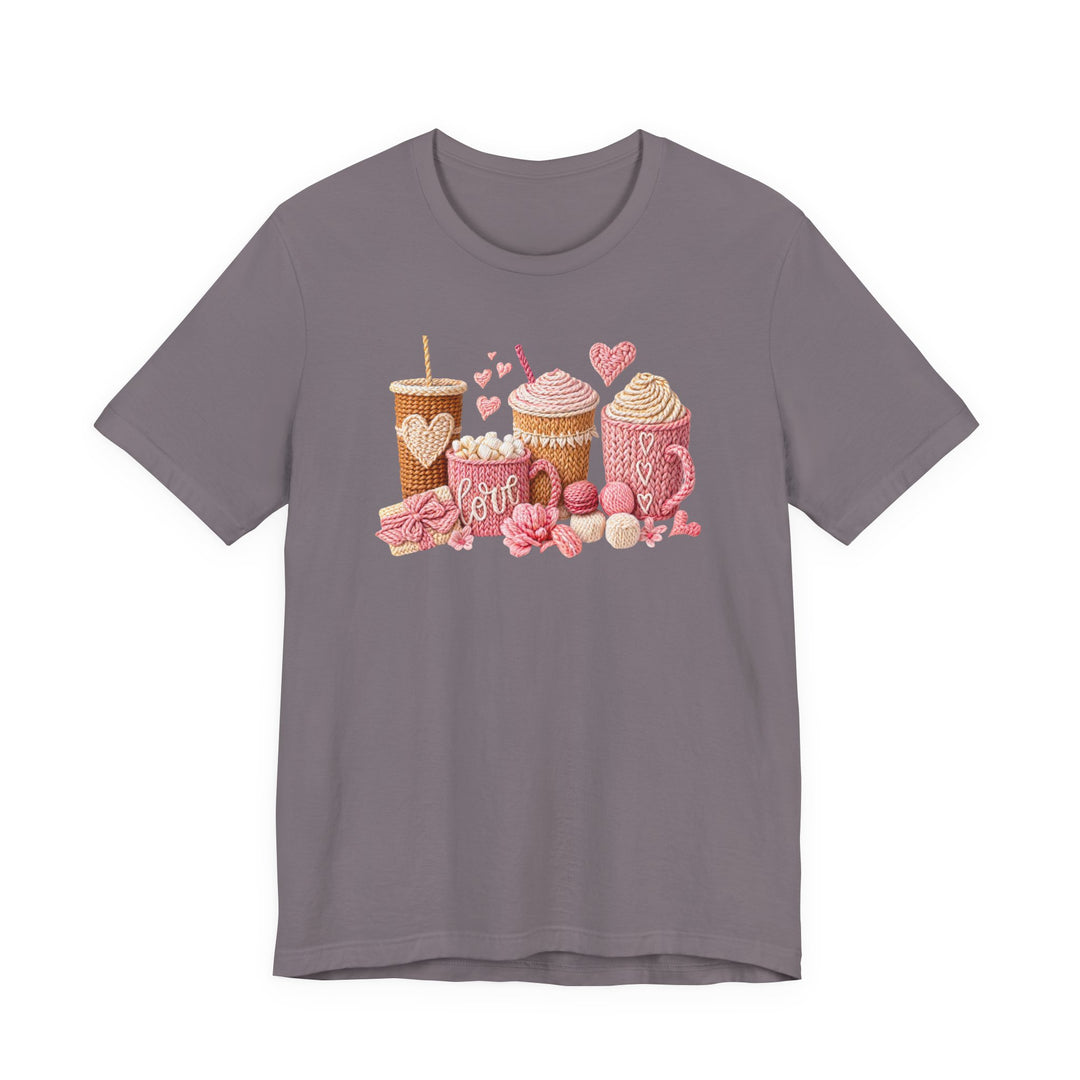 Coffee Love Tee featuring knit-art hot-drink designs and pink hearts on a lavender-gray background, showcasing a cozy style with quality cotton and durable fit.