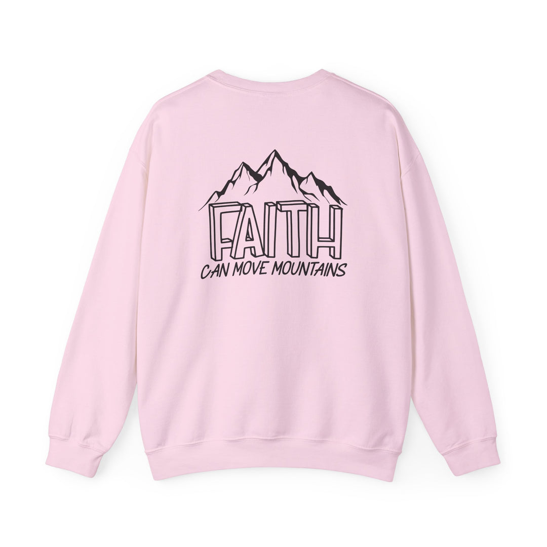 Unisex Faith Can Move Mountains Crew sweatshirt in pink with a mountain graphic. Heavy blend fabric for comfort, ribbed knit collar, and durable double-needle stitching. Ethically made from 50% cotton, 50% polyester.