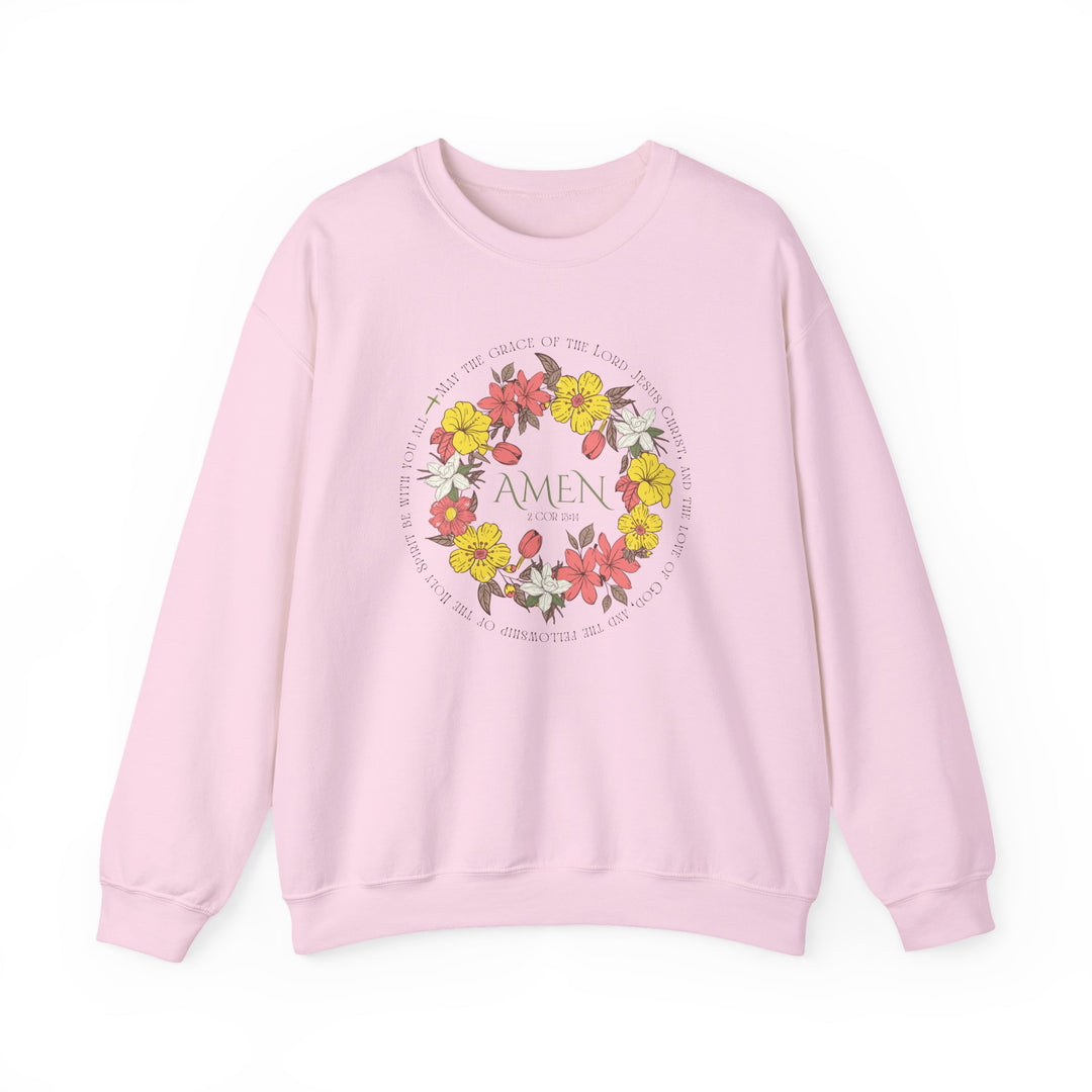 Amen Crew pink sweatshirt featuring a floral design, showcasing ribbed collar and double-needle stitching for durability and comfort in a medium-heavy polyester-cotton blend.