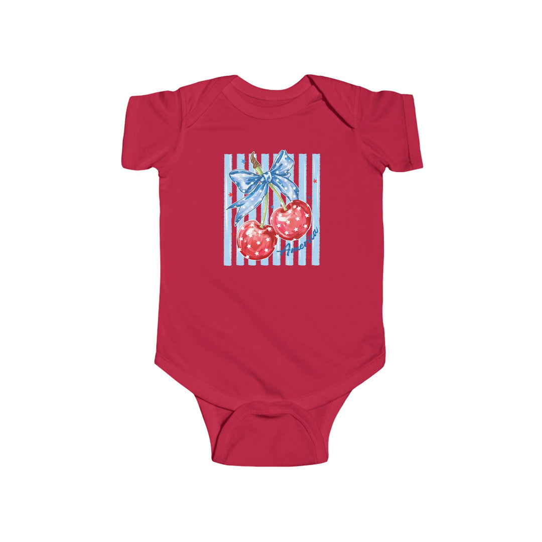 American Cherry Onesie: Red baby onesie with patriotic cherry graphic, featuring white stars and a blue bow, on a light blue, star-studded striped background.