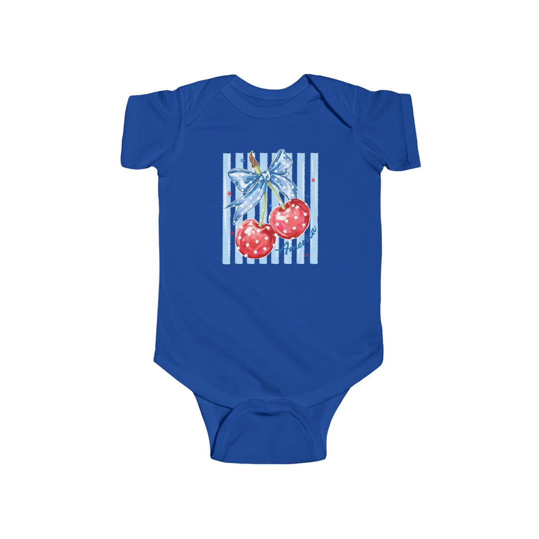 American Cherry Onesie: Cobalt-blue baby bodysuit featuring red cherries with stars and a bow, offering soft, durable cotton comfort and easy snaps for changing.