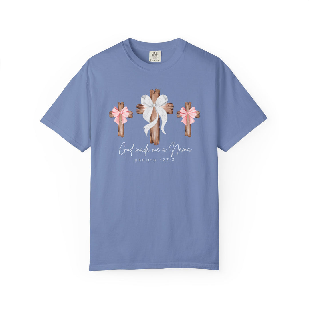 Light-blue God Made Me a Nana T-shirt with three rustic crosses, featuring bows and scriptural reference. Comfortable, relaxed fit, made of durable, heavyweight cotton.