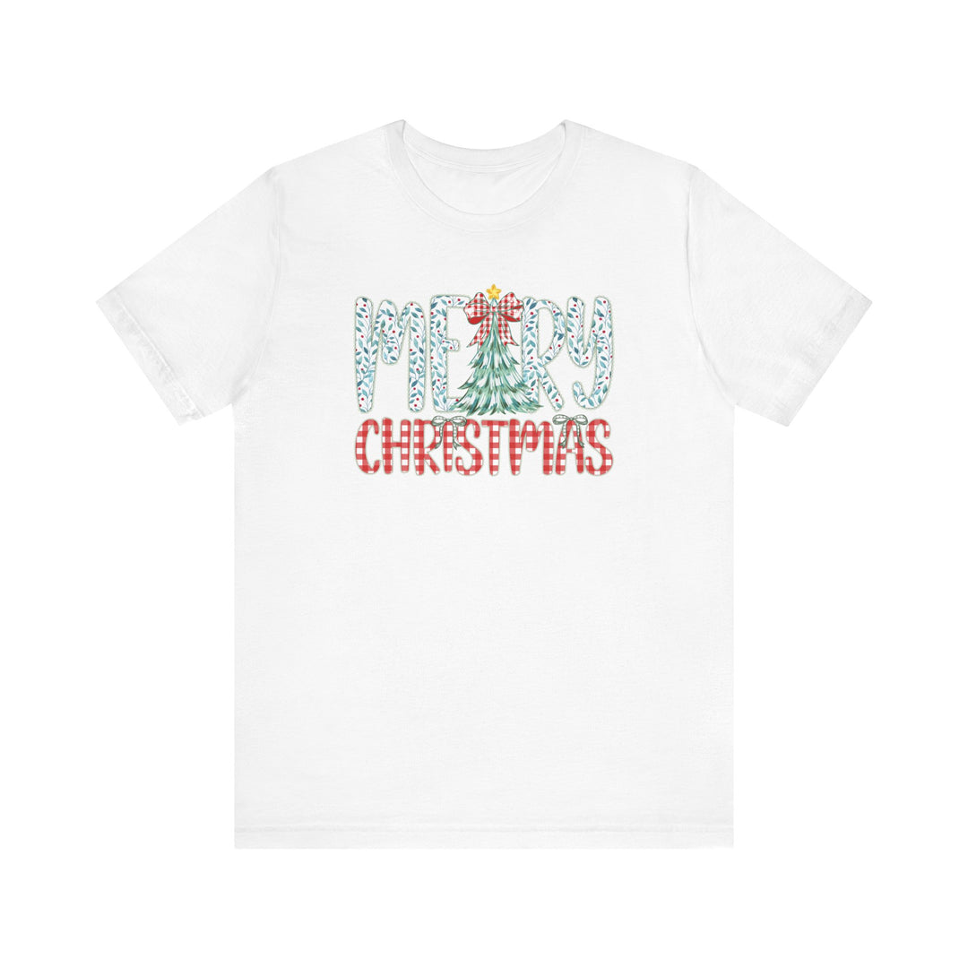 Tree Christmas Tee: White T-shirt with Merry Christmas in holly-leaf and gingham-style font, offering a festive, comfortable fit from Faith Family Designs.