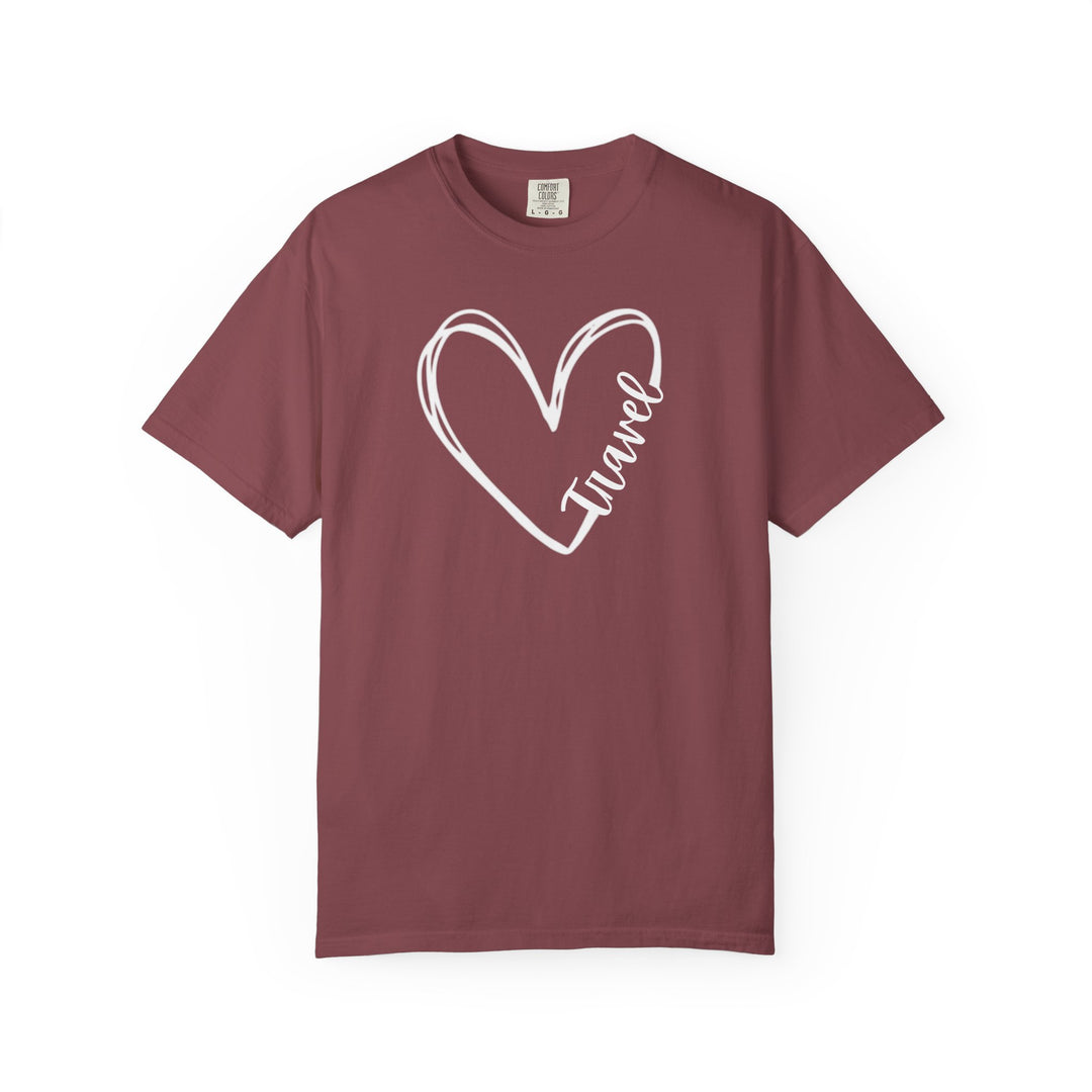 Maroon crew-neck tee with a white heart line-drawing featuring Travel in script, offering a relaxed fit and durable, garment-dyed cotton comfort.