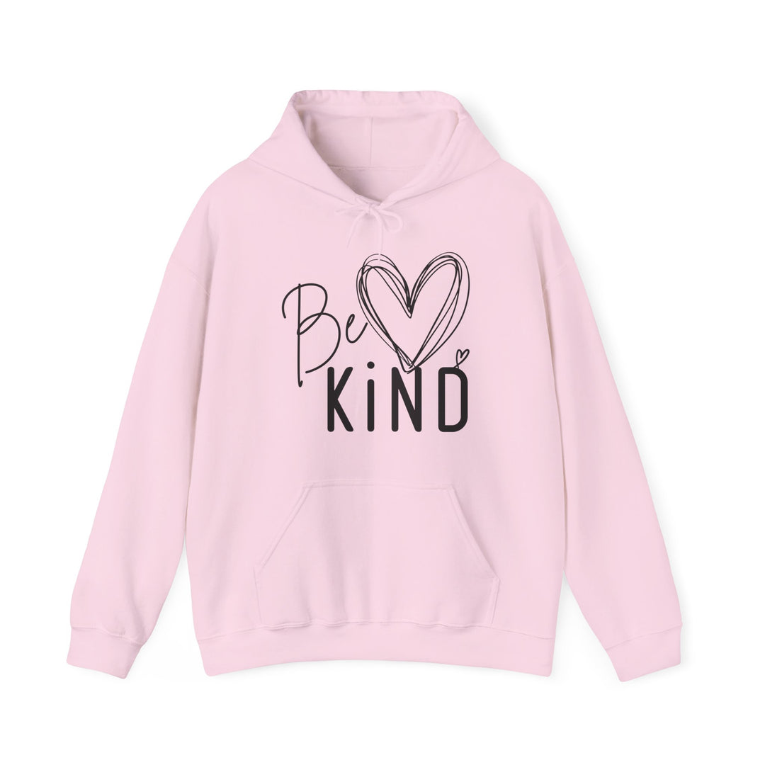 Light-pink Be Kind hoodie with kangaroo pocket, drawstring hood, and hand-drawn heart design, offering comfort and warmth with a cotton-polyester blend.