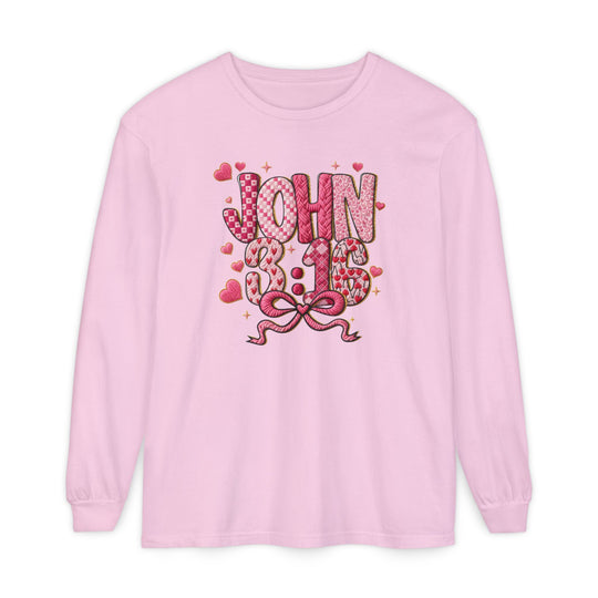 Light pink 3:16 Long Sleeve Tee with JOHN 3:16 graphic, featuring textured letters and pink patterns, surrounded by hearts and sparkles, offering comfort and style.