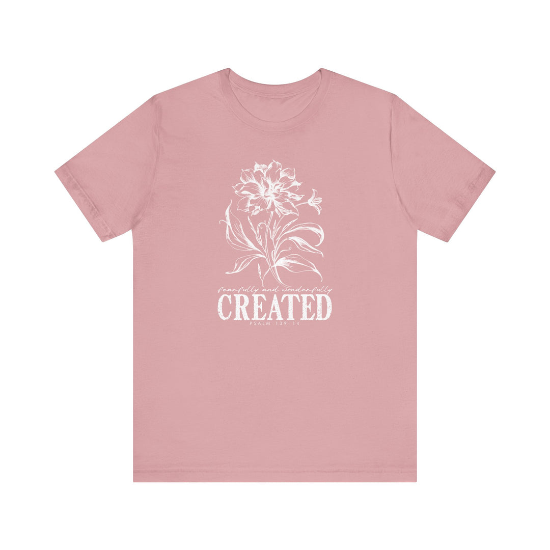 Created Tee, a soft, unisex jersey with ribbed knit collars and tapered shoulders, offering a comfortable fit ideal for casual settings.