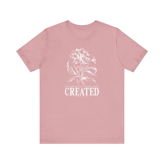 Created Tee, a soft, unisex jersey with ribbed knit collars and tapered shoulders, offering a comfortable fit ideal for casual settings.