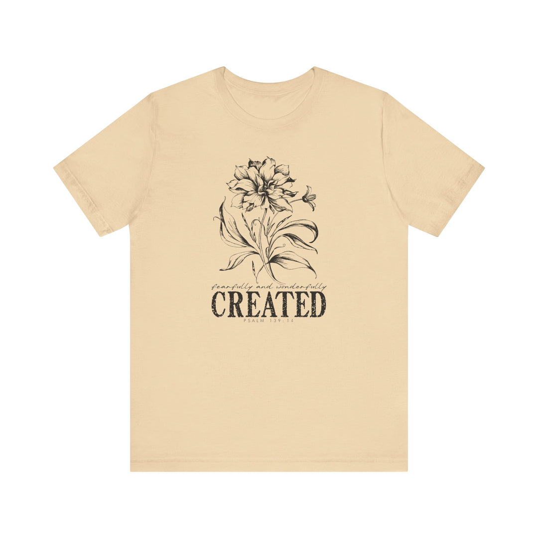 Unisex Created Tee with a crew neckline, ribbed knit collars, and tapered shoulders, offering a comfortable, durable fit with breathable cotton fabric.