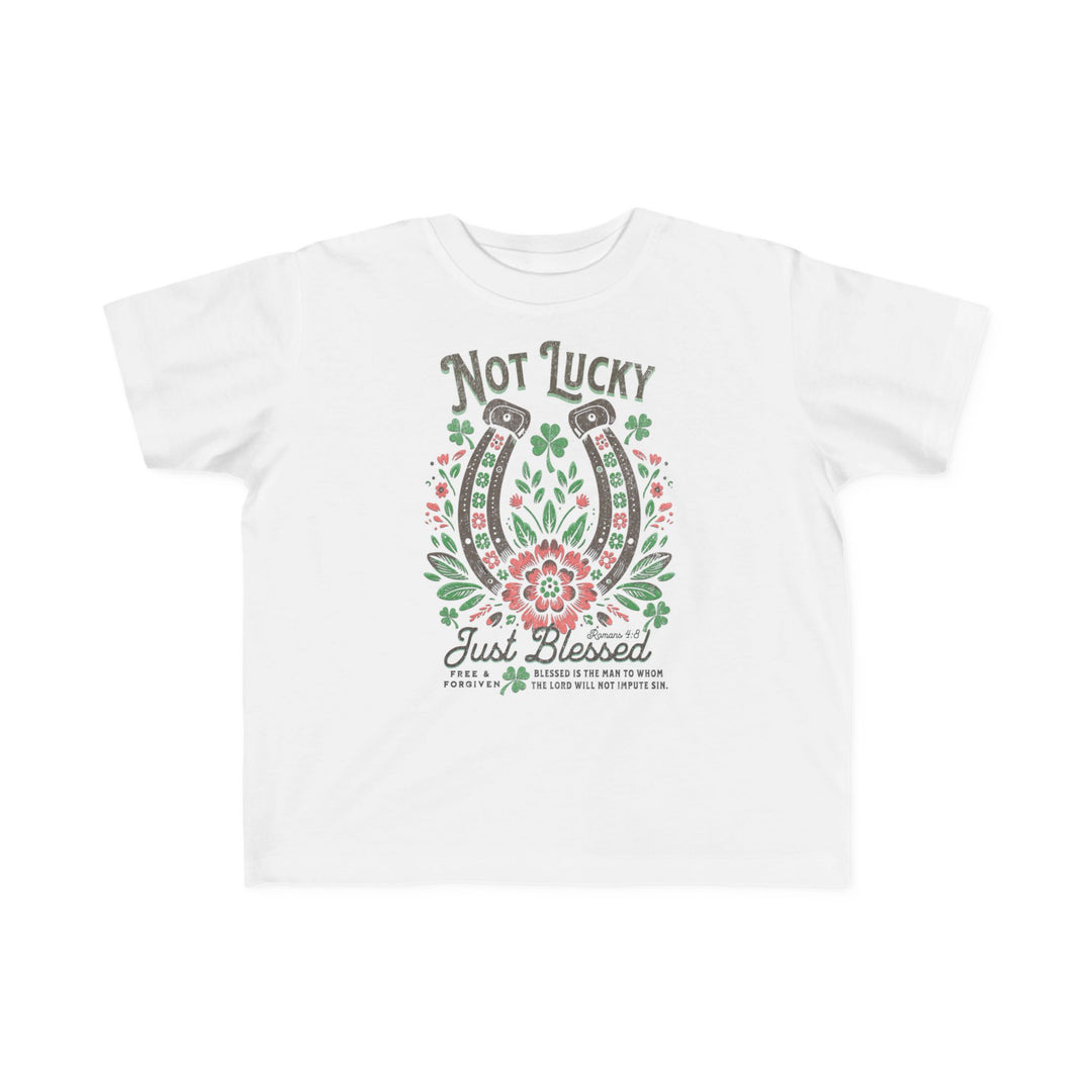 Blessed Toddler's Tee: White t-shirt featuring a graphic design of a horseshoe and flowers, crafted for toddler comfort with soft, durable cotton.