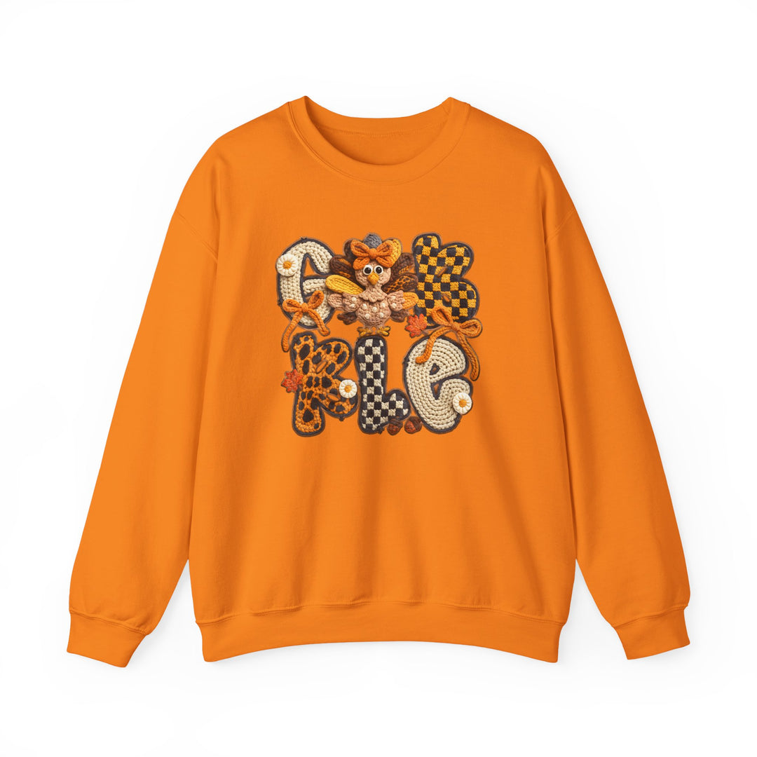 Gobble Crew sweatshirt featuring a textured Thanksgiving-themed applique with varied patterns and a cartoon turkey, laid flat on a white background.