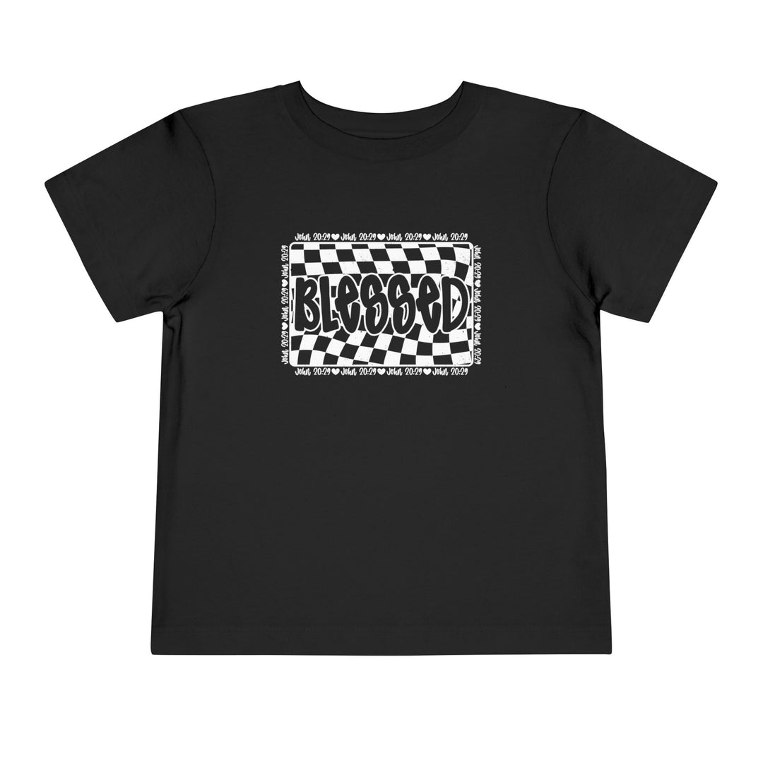 Blessed Toddler Tee: A black short-sleeve t-shirt with a checkered design, crafted from 100% Airlume cotton for comfort, perfect for everyday wear.