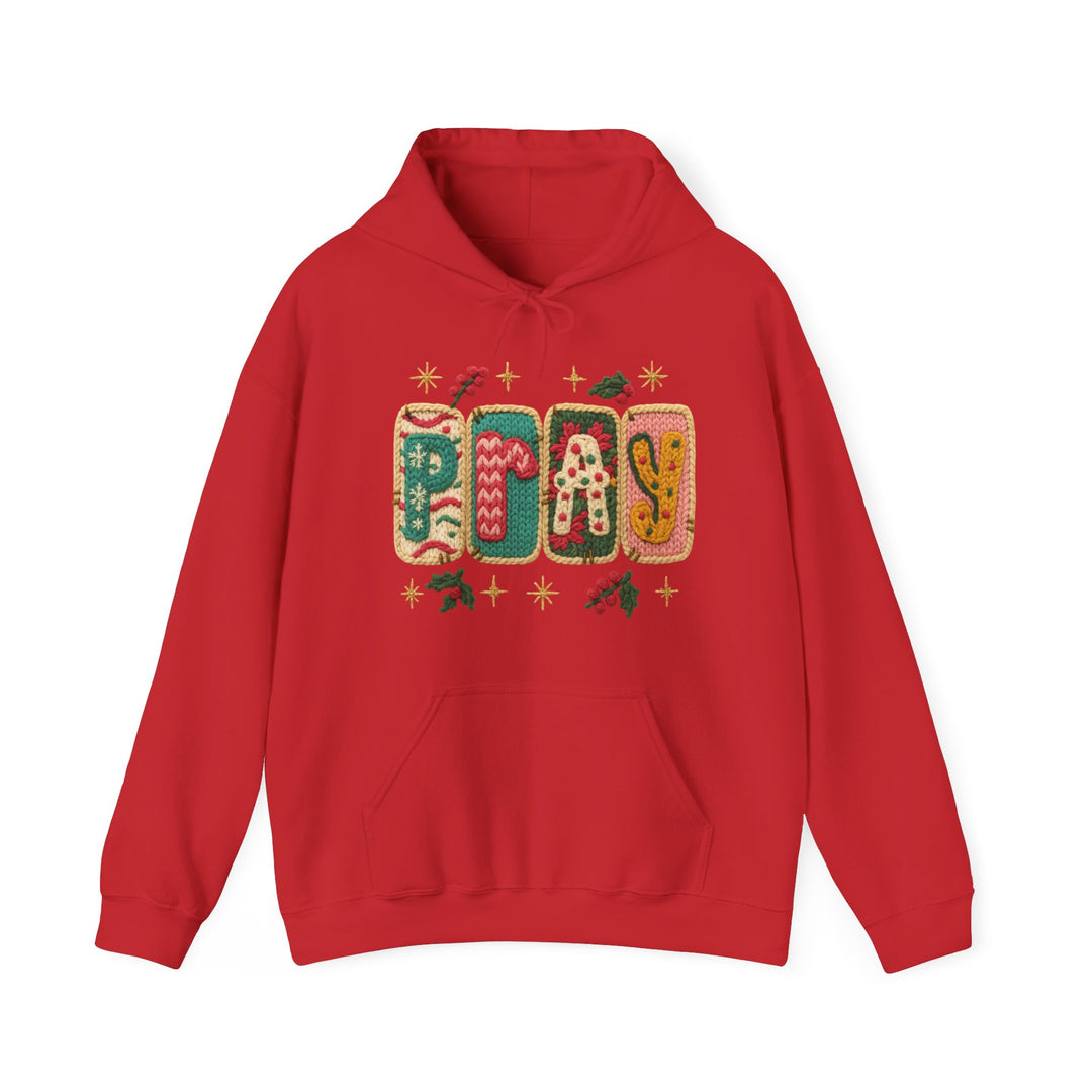 Red PRAY hoodie with festive graphic, kangaroo pocket, and drawstring hood, crafted for warmth and comfort from a cotton-polyester blend.