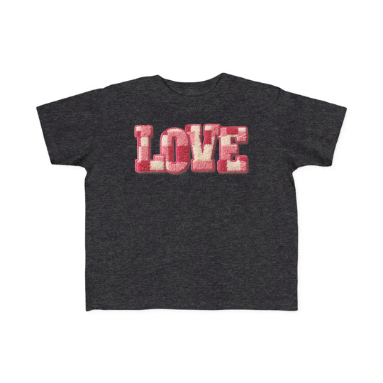 Love Toddler Tee featuring LOVE in fluffy pink and off-white chenille letters on a dark charcoal-grey, short-sleeved shirt, perfect for toddlers' sensitive skin.