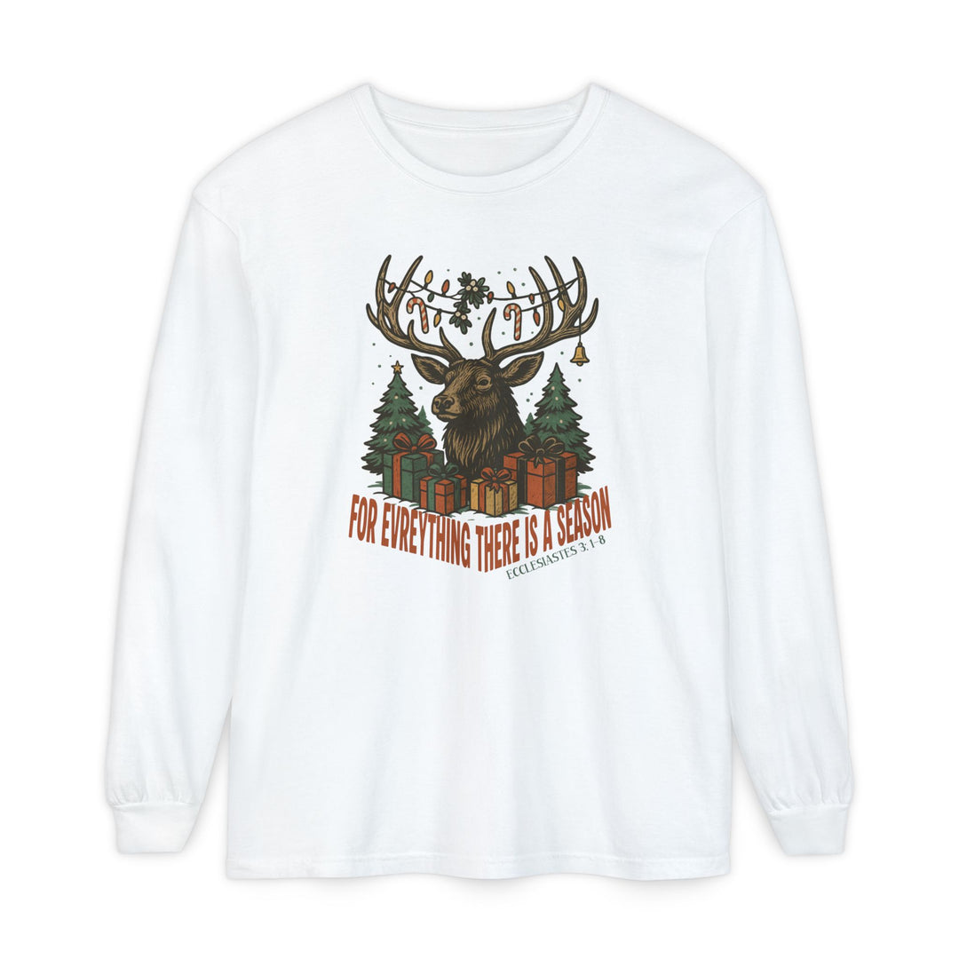 White long-sleeve T-shirt with festive deer-head graphic, adorned antlers, Christmas trees, gifts, and Bible verse, For everything there is a season. Classic fit, 100% ring-spun cotton.