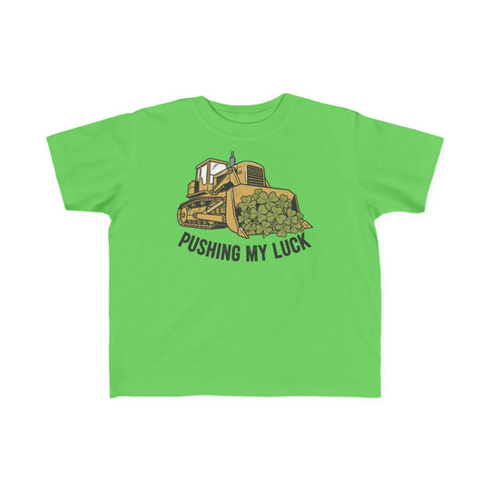 Pushing My Luck Toddler Tee: A bright green shirt with a yellow bulldozer and clovers graphic, ideal for toddlers, providing softness and durability for playful adventures.