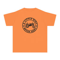 Bright orange kids' tee with a black emblem featuring a vintage tractor and wheat, captioned A LITTLE DIRT NEVER HURT, highlighting play-friendly comfort.