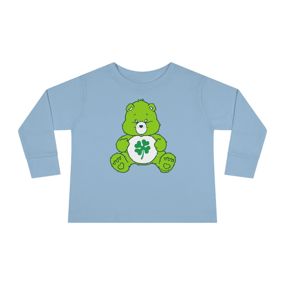 A durable Lucky Bear Toddler Long Sleeve Tee made of 100% cotton, featuring a green bear with a clover cartoon, perfect for active kids. Designed for comfort and longevity with ribbed collar and EasyTear™ label.