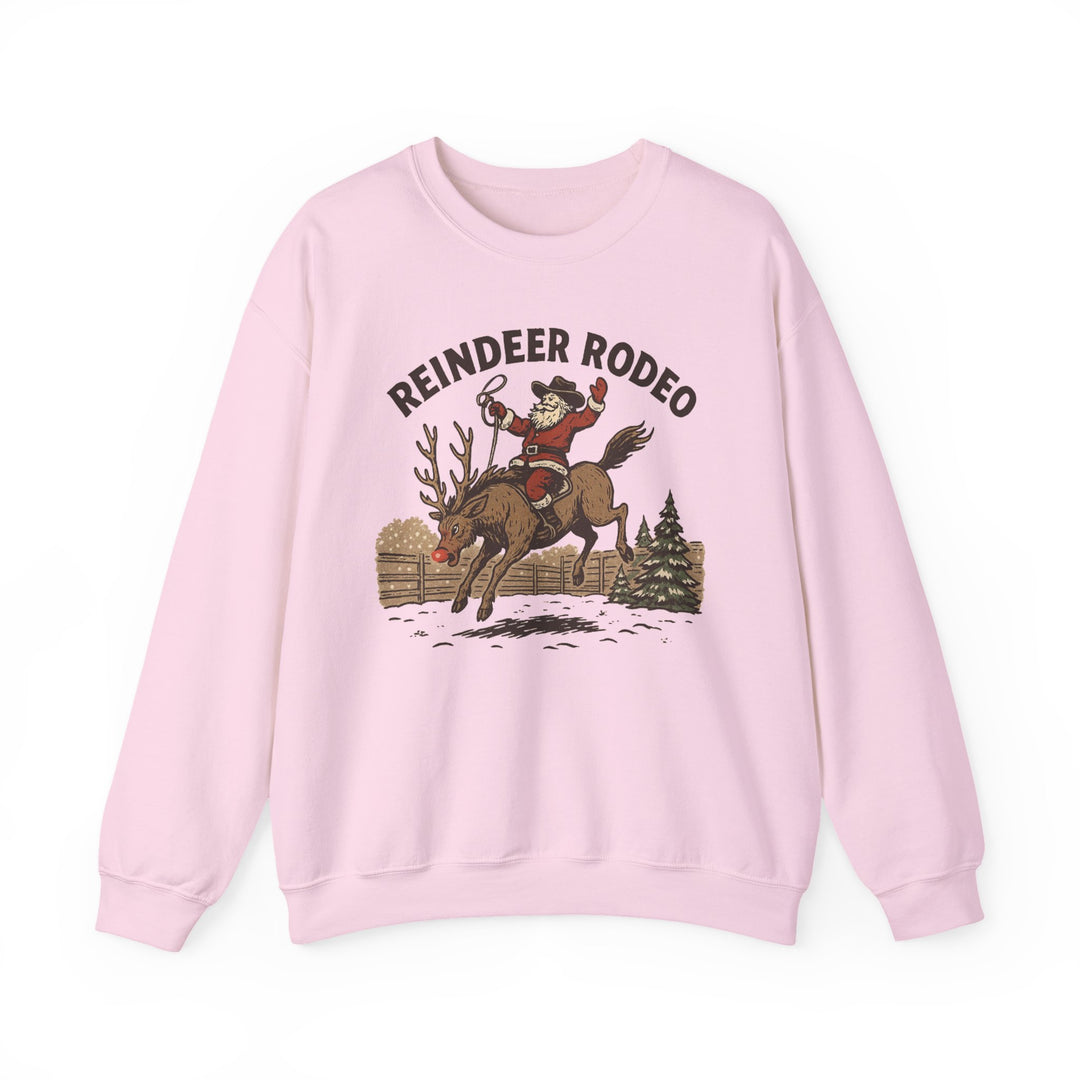 Reindeer Rodeo Crew sweatshirt with Santa riding a red-nosed reindeer in a snowy corral. Cozy blend, classic fit, ideal for cooler months, unisex.
