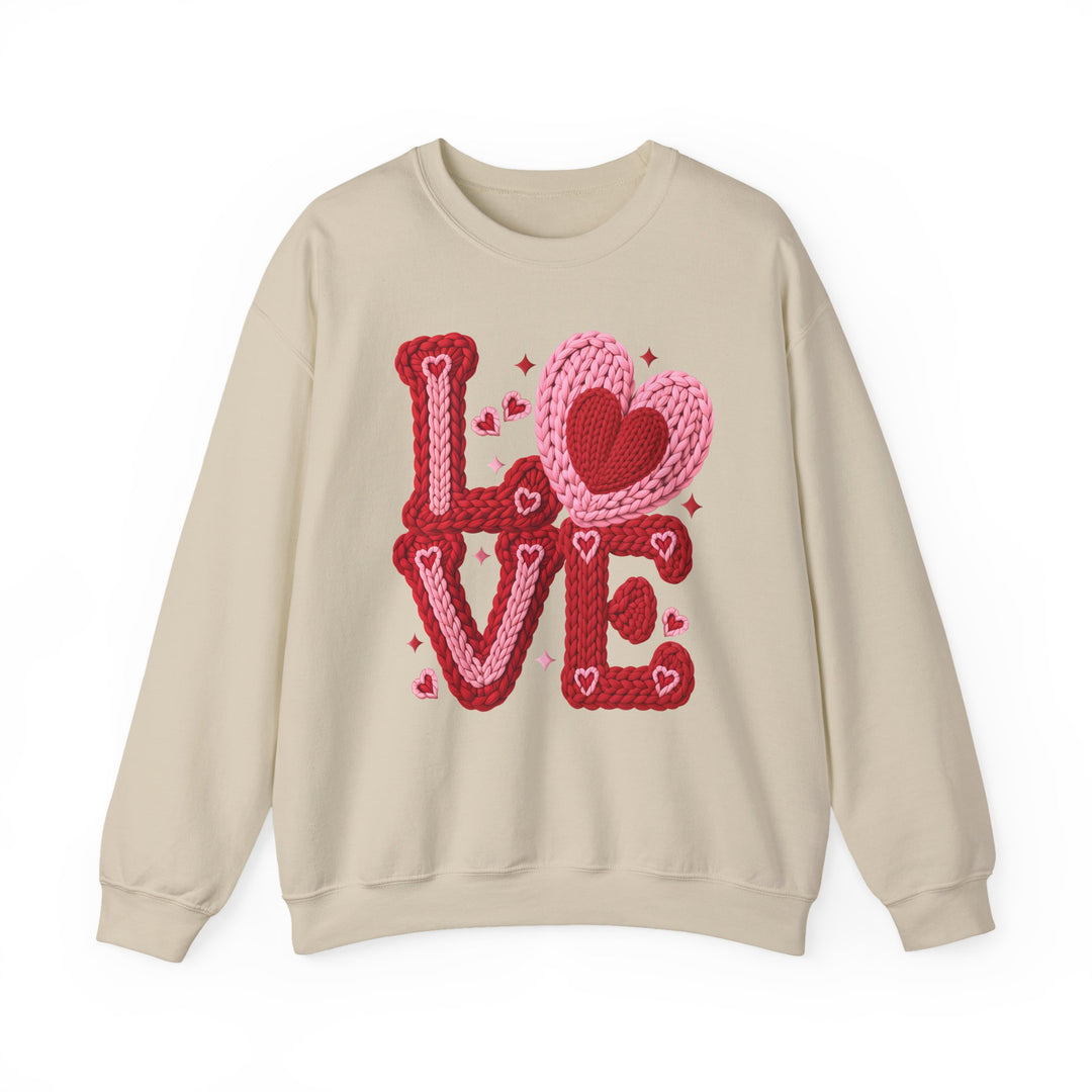 Love Heart Crew sweatshirt featuring LOVE in chunky knit style with a pink heart replacing the O, ideal for comfortable, stylish wear.