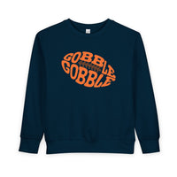 Dark-navy toddler sweatshirt featuring a vibrant orange football graphic with GOBBLE GOBBLE text, designed for comfort and durability by Faith Family Designs.