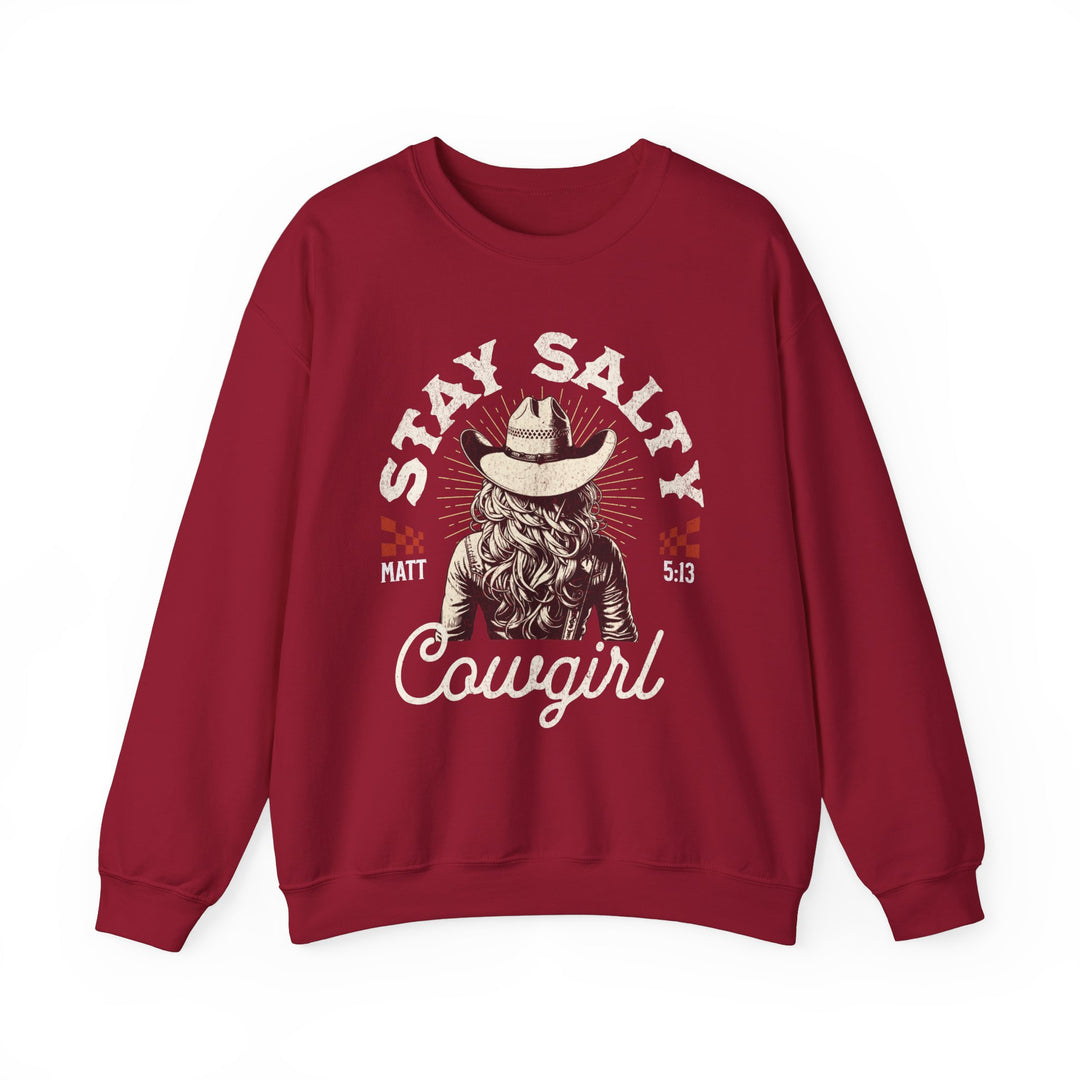 Stay Salty Crew red sweatshirt featuring a cowboy hat and cowgirl graphic, offering comfort with its polyester-cotton blend, ribbed collar, and seamless design.