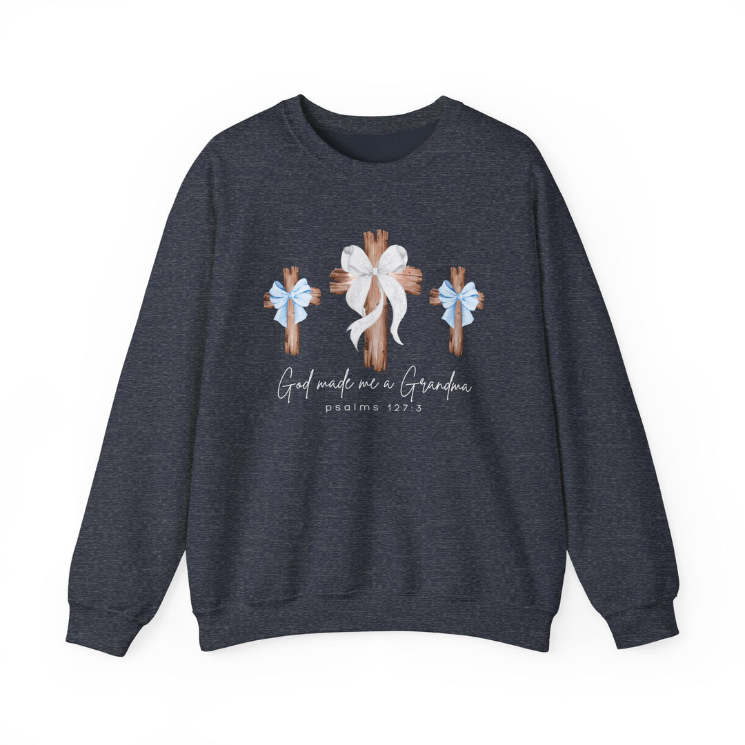 God Made Me a Grandma Crew sweatshirt with three wooden crosses, center adorned with lace bow, script text, and Psalms 127:3, offering cozy comfort.