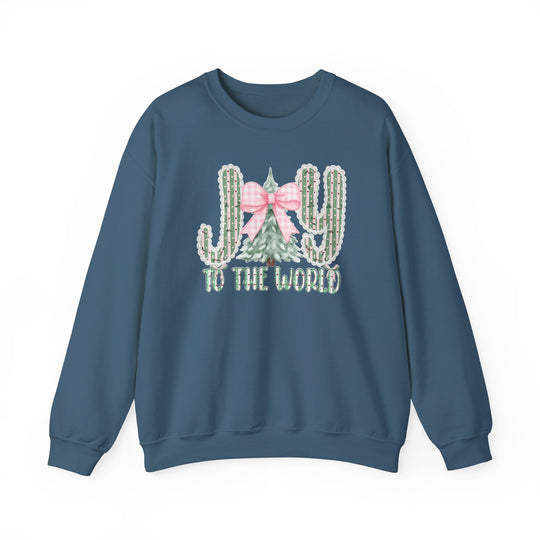 Teal-blue crewneck sweatshirt with JOY holiday graphic; cactuses as J and Y, Christmas tree as O, and TO THE WORLD below. Cozy, durable blend.