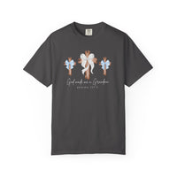 Dark-gray T-shirt with three wooden crosses, center cross has large white bow, side crosses have light-blue bows, and script reads 'God Made Me a Grandma' with psalms reference.